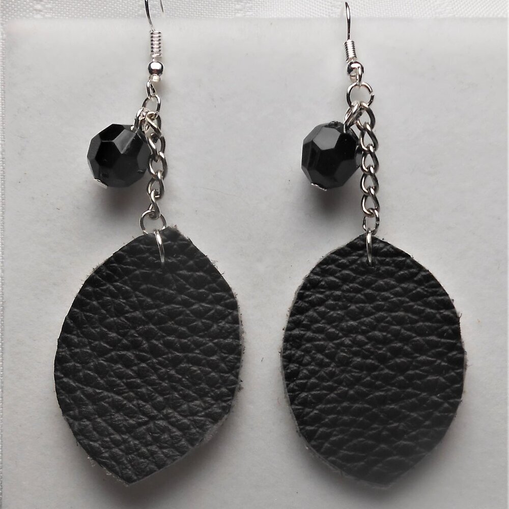 No. 184 Handmade earrings with leather pieces 2 1/2 inches long